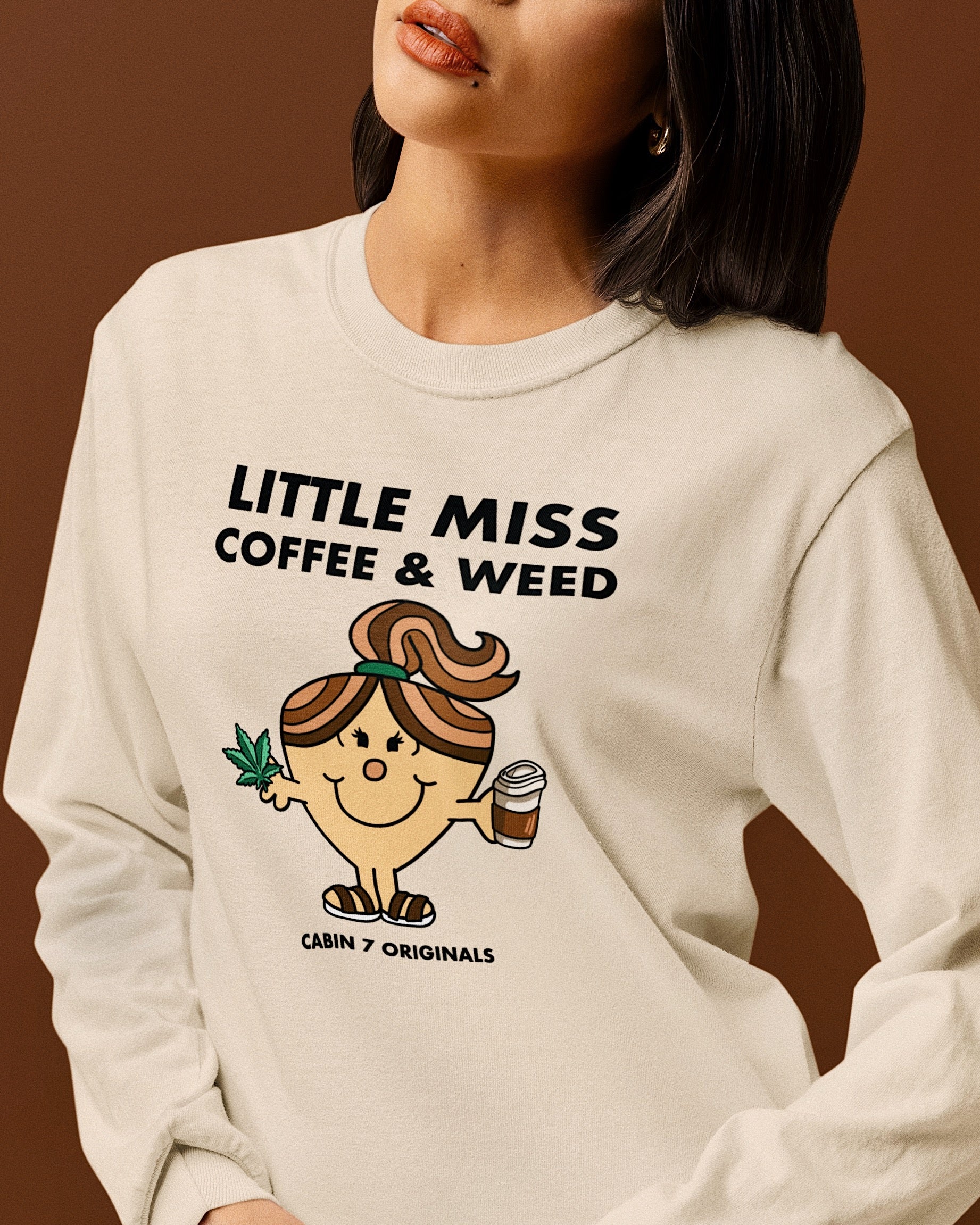 A long sleeve t-shirt with black text reading 'LITTLE MISS COFFEE & WEED' and a Little Miss character holding a coffee cup and cannabis leaf.