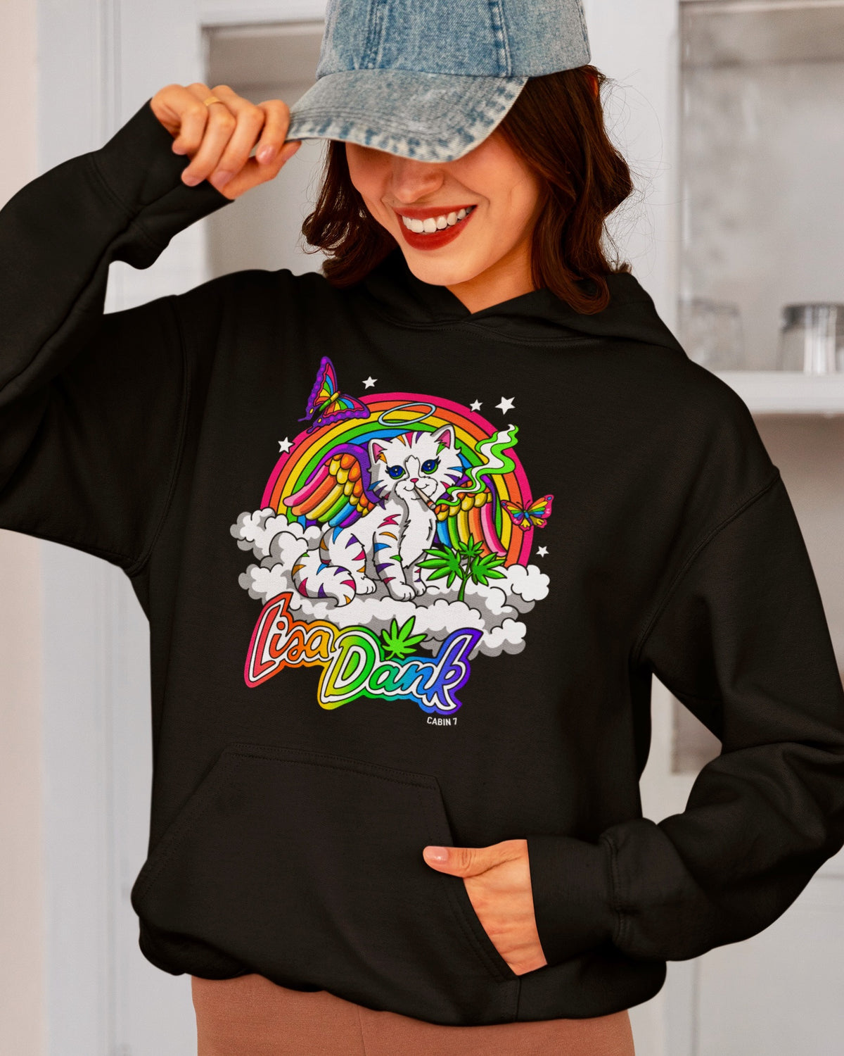 A black hoodie with a colorful stoner Lisa Frank style design, featuring a kitten with angel wings, a rainbow, and a weed plant. Text says "Lisa Dank". Hippie hoodie, stoner hoodie, 420 hoodie.