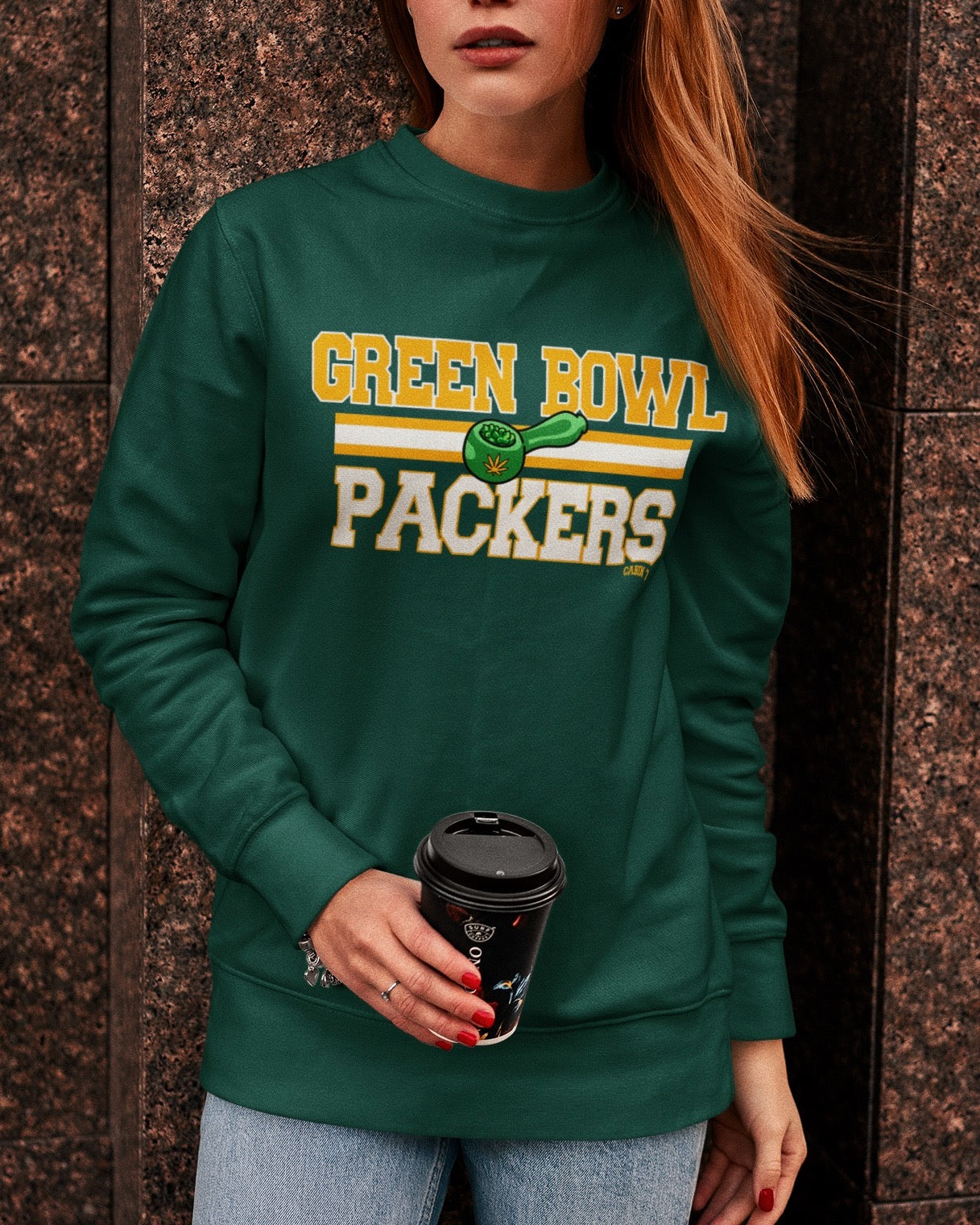 A dark green crewneck sweatshirt with 'GREEN BOWL PACKERS' printed in yellow and white with a green football graphic. Green Bay Packers stoner apparel, 420 apparel, hippie apparel.